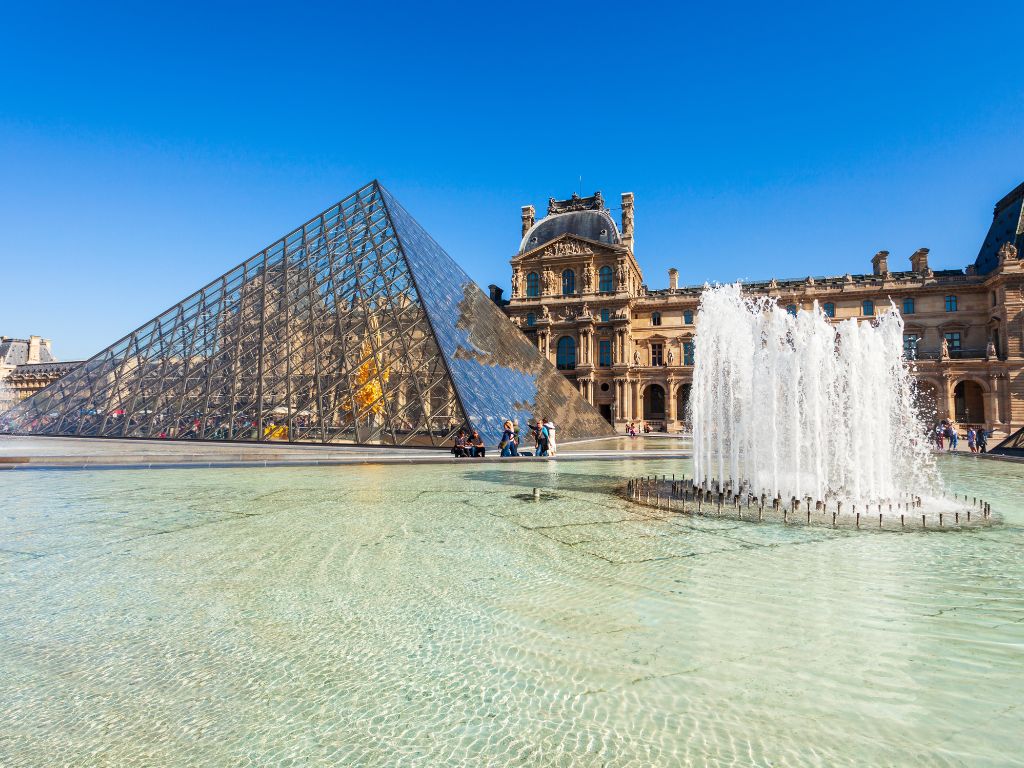 Art lovers mesmerized by famous masterpieces at the Louvre Museum in Paris